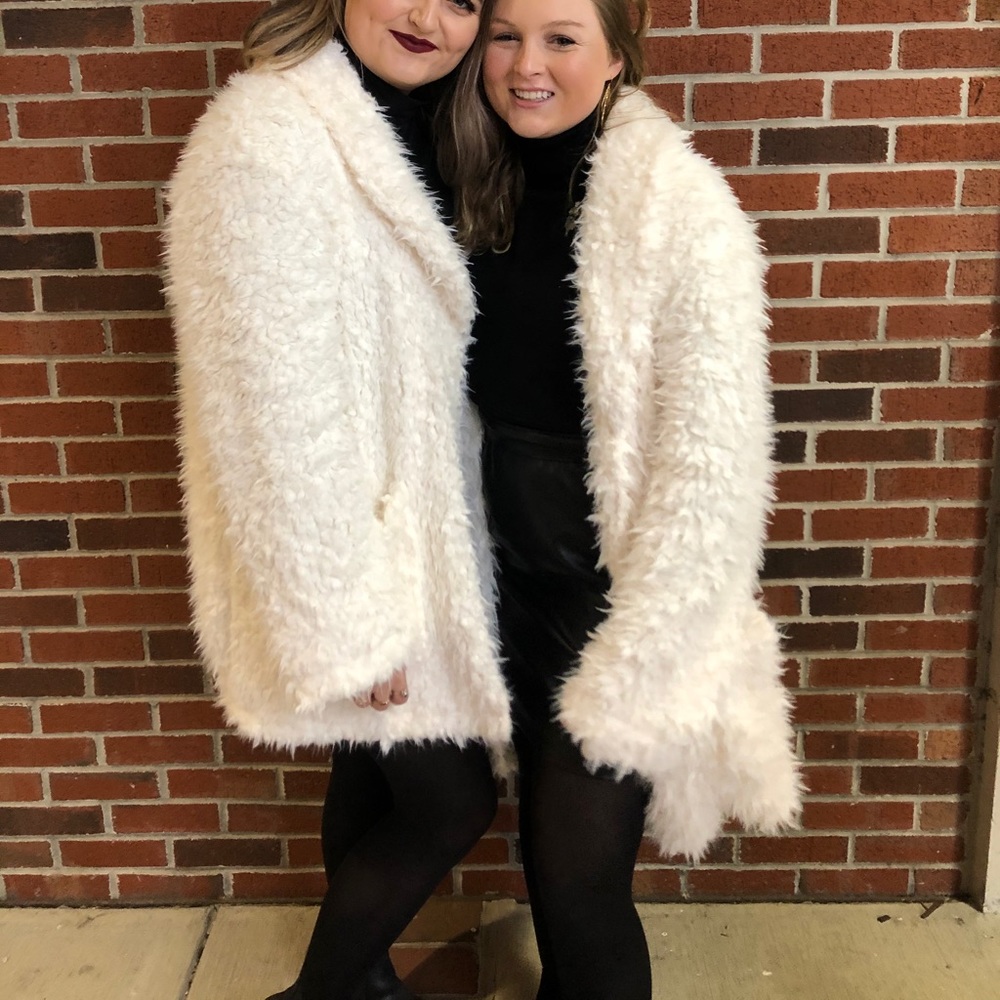 white fluffy coat